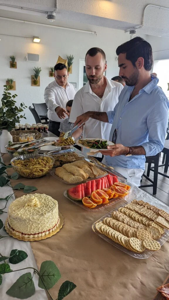 PEOPLE ENJOYING CATERING EVENT